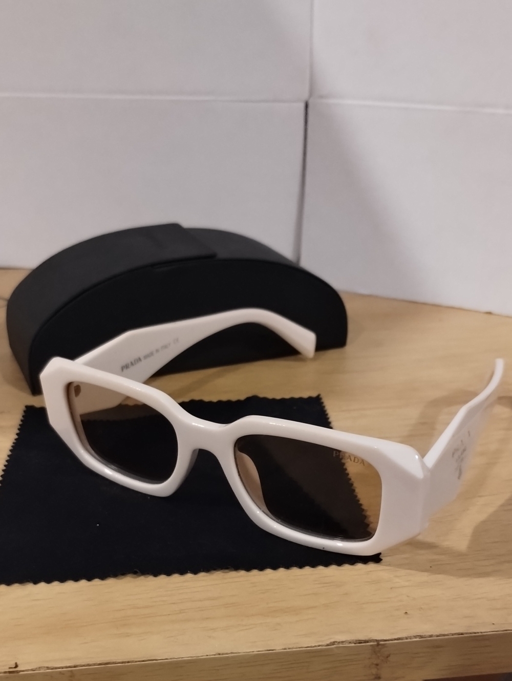 Prada Cream Rectangular Sunglasses with Light Brown Lenses.     (38)